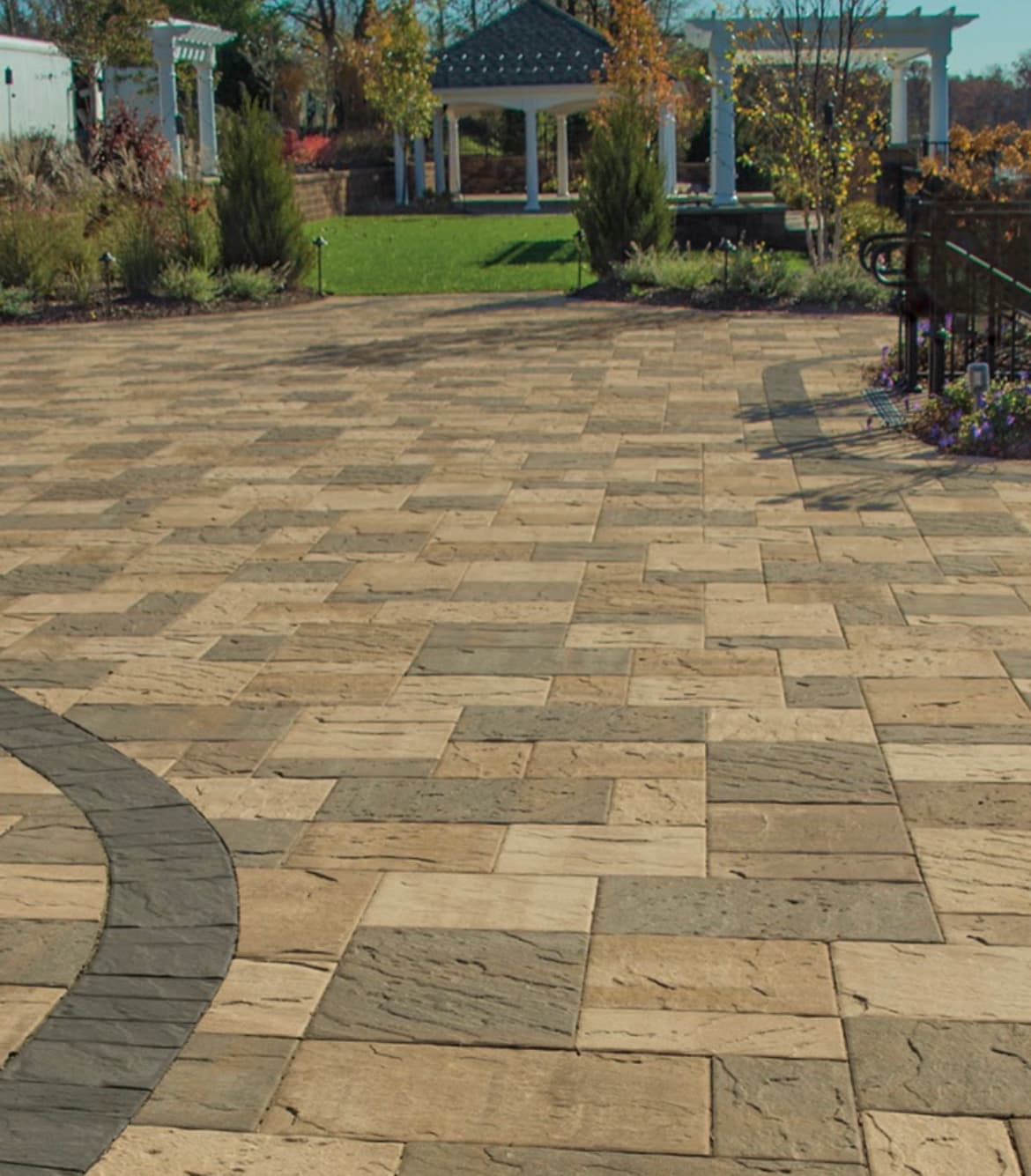 Elegant brick paver pool deck surround