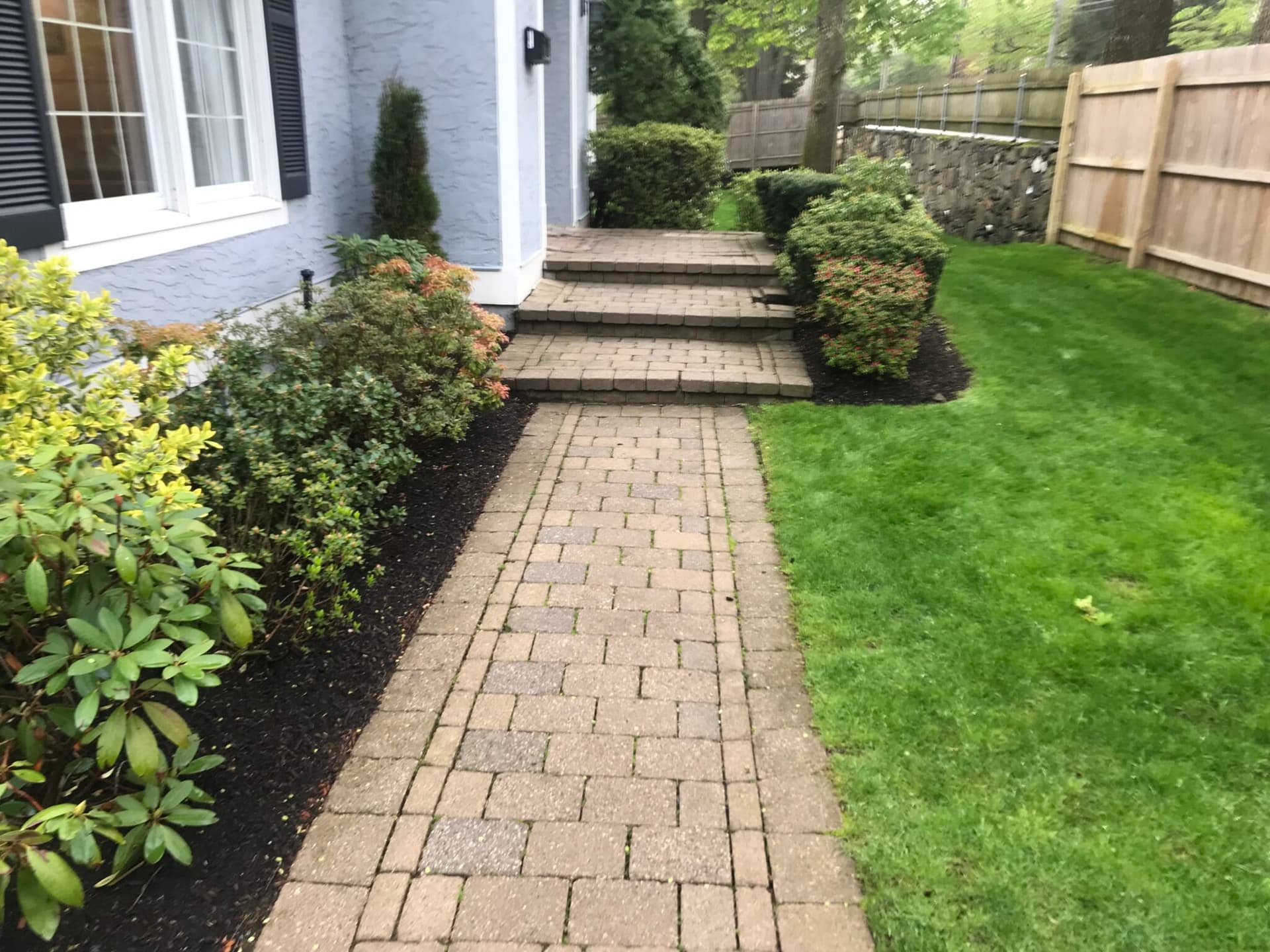 Beautiful natural stone paver pool deck and walkway